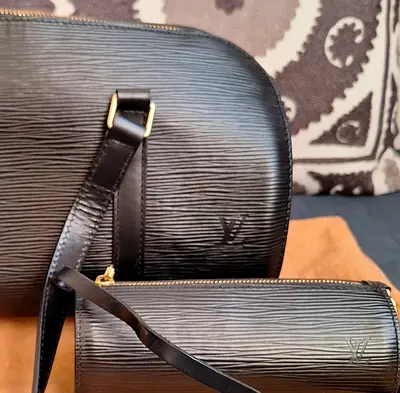 Black textured leather Louis Vuitton-style crossbody bag (set of 2).