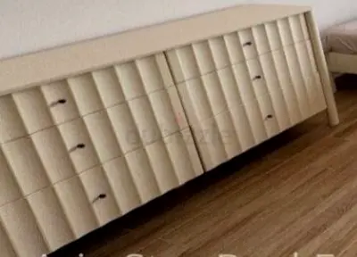 Low beige sideboard ,dresser with textured front - good condition