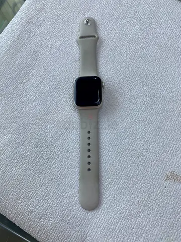 Used Apple Watch-style Smartwatch with Light Grey Silicone Band - Good Condition