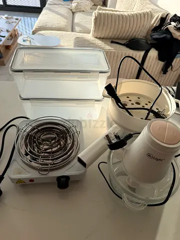 Collection of small kitchen and bathroom appliances – steamer, mini heater, storage boxes etc.