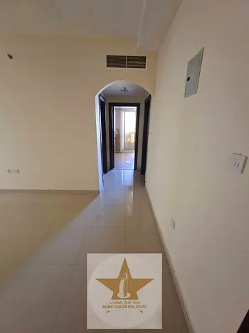 Unbeatable Deal in Al Butina! Spacious 1BHK with Balcony & Central AC near Nesto (4 Cheques Only)! 🏢✨ : Looking for a cozy, clean, and be