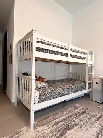 White Wooden Bunk Bed (Solid Frame) - Good Condition with 2 new mattress . Can be as a 2 separated b