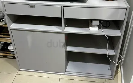 Cabinet and mattress topper