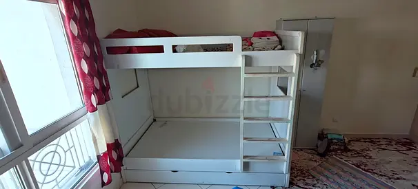 Custom made White wooden bunk bed with ladder and storage drawer - good condition and very sturdy.