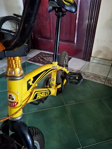 Yellow kids bicycle, small frame, good condition