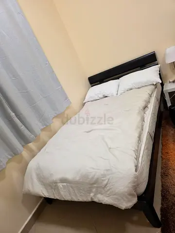 Double wooden bed frame with mattress and headboard - good condition