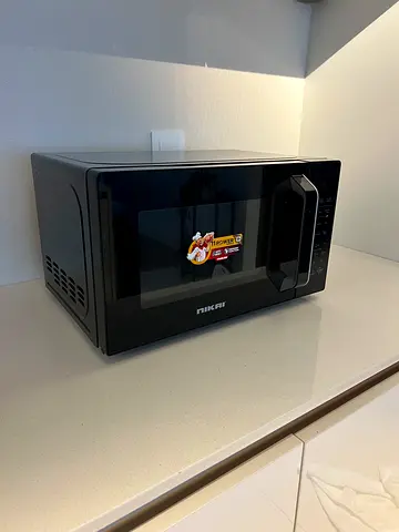 Black countertop microwave oven + Philips two slot toaster + kettle all in one  used, good condition