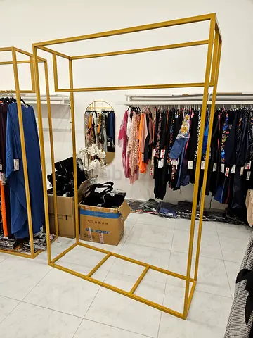 Tall vertical stand gold