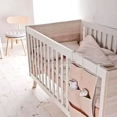 Solid Wood Convertible Baby Crib with Side Storage Pockets - White