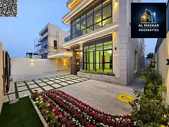 Luxury villa with a modern smart design, two floors, roof, and garden, directly on Ammar Street. Pr