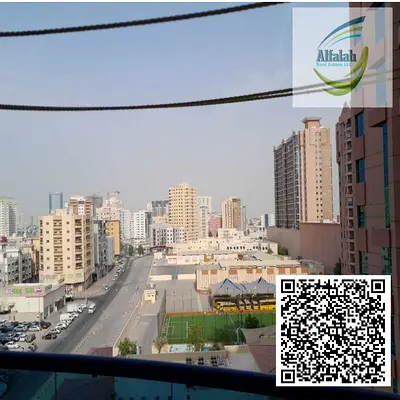 Three-bedroom apartment with a living room and a maid's room in Al Nuaimiya Towers