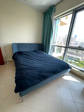 IKEA Blue upholstered double bed frame and mattress in good condition