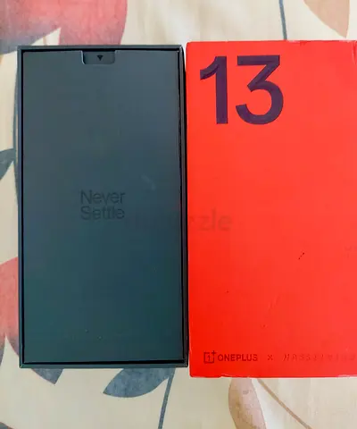 Flawless, Sparingly used Oneplus 13 in good as new condition.