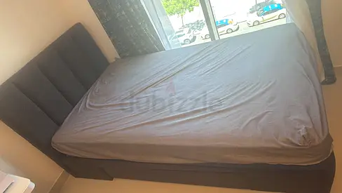Danube Queen fabric storage bed with headboard - good condition with medical mattress  deep storage