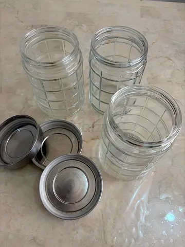 Set of 4 Glass Storage Jars with Metal Lids