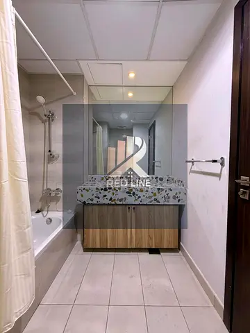 Two-bedroom apartment with a living room for rent in Al Zahia Garden, featuring premium finishes an