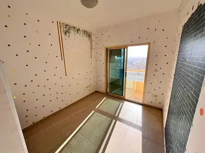 1 Bedroom Apartment for Annual Rent in Emirates City – Al Amerah, Ajman | AED 25,000 | Central AC |