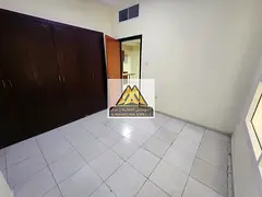 1BR apartment Garden City Towers Al Hamidiya open kitchen AED 23,500 yearly 4 payments prime locatio