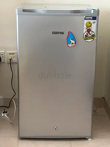 Single-door compact fridge in good working condition.