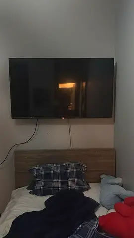 55 Wall-Mounted LED TV in Good Working Condition