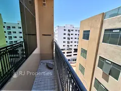 2 BR apartment - balcony - family building - close to bus stop - easy access for Dubai