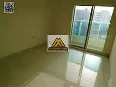 1BR apartment Nakheel 1 second row Corniche separate hall master room 2 bathrooms balcony private pa