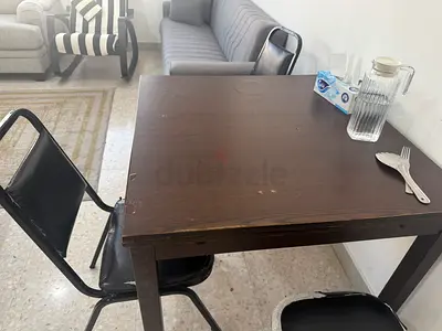 Used dark wood dining table - solid simple design