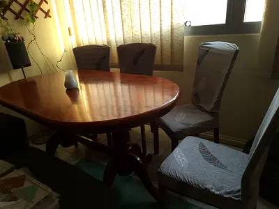 Solid Wood Oval Dining Table with 4 Chairs in Great Condition