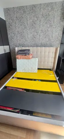 Queen storage bed frame with headboard and hydraulic storage - used