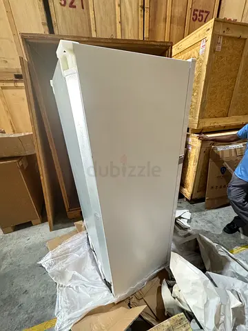 Tall single-door refrigerator / freezer unit - unused, in storage