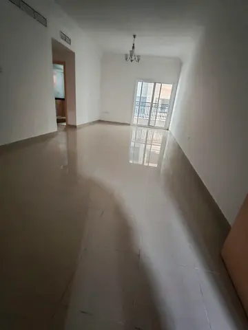 Two bedroom apartment for rent in Al Nahda Sharjah direct Dubai exit spacious layout master bedroom 2 bathrooms balcony central AC natural gas built i