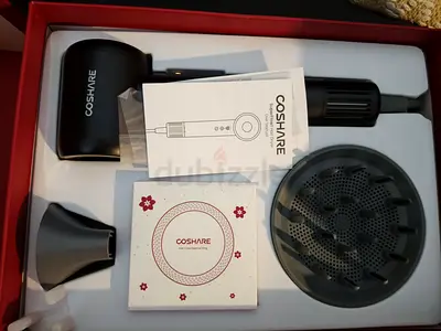Brand new COSHARE hair dryer with diffuser air tag and nozzle - unused in box
