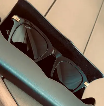 Cartier black sunglasses in hard case