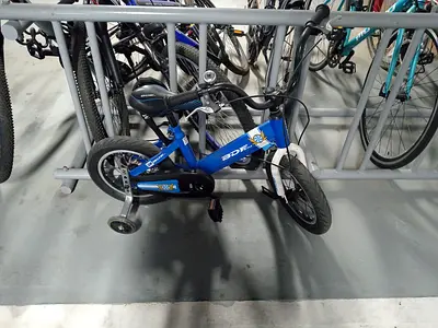 Kids blue 12-inch bike with training wheels - good condition