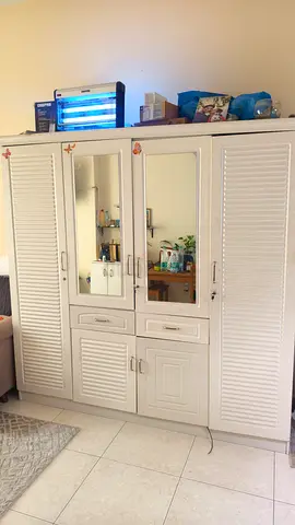 White 4-Door Wardrobe with Mirrors and Drawers.