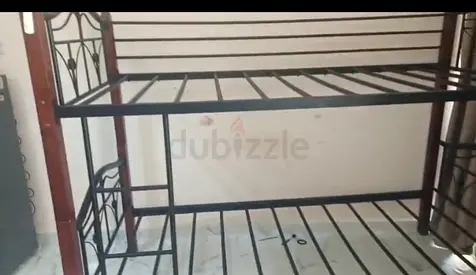 Wooden and steel bunk bed