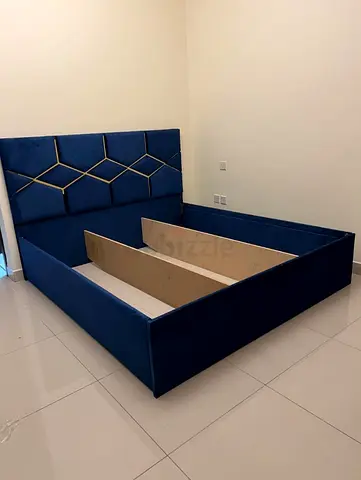 King size blue velvet bed frame with geometric headboard