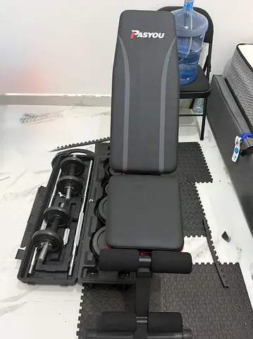 Adjustable workout bench with 30 KG dumbbell set — used, good condition