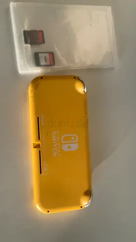 Nintendo Switch Lite Yellow + 2 Games – Great Condition 🎮