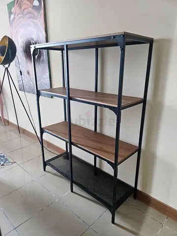 Industrial-style metal shelving unit with wooden shelves