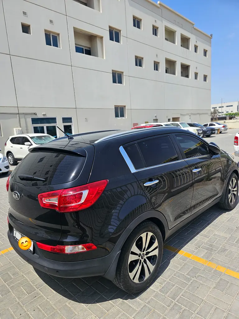 Kia Sportage 2014 — photo 1 of 9