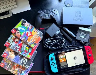 Nintendo Switch Bundle + 4 Games + Controller + Dock – Excellent Condition