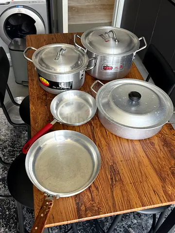 Only two pans have been used. The pots and pans are new and unused.