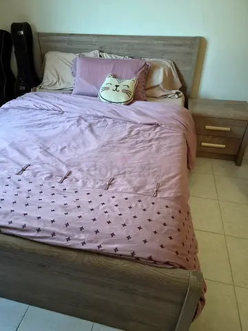 Queen bed with headboard and matching bedside table, mattress included - light wood