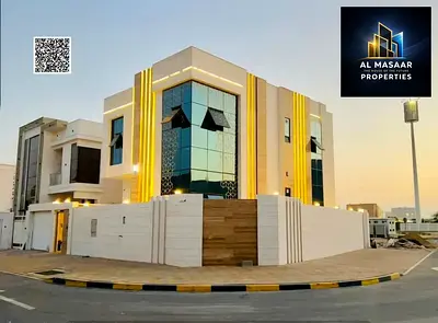 Villa (corner) on two streets in Al Zahiyah area, Ajman (two floors + roof) at a price including water and electricity connections. Prime location on