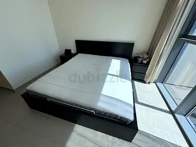 IKEA MALM bed (180×200) with a lift-up storage mechanism and IKEA mattress.