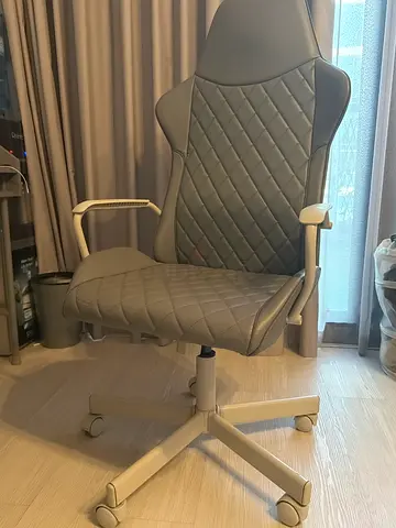 Gray table with drawers and grey Quilted Ergonomic Office Chair with Armrests and Wheels