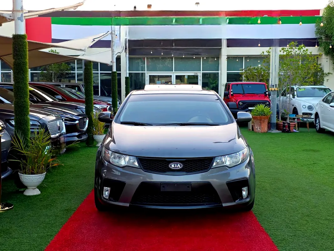 Kia Cerato 2012 — photo 1 of 20