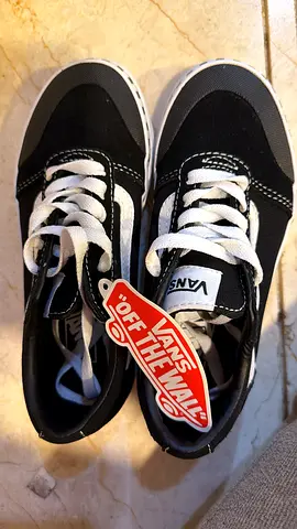 Pair of Vans black  white low-top sneakers — brand new with tags, size visible on request