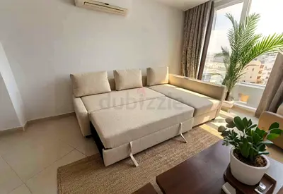 ikea Light beige L-shaped sofa bed with storage — good condition